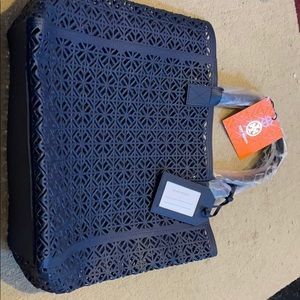 Tory Burch laser cut out tote with luggage tag